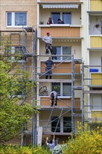 Dresden Plattenbau refurbishment in the Dresden Leubnitz area. Scaffolding in front of thermal