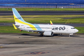 An Air Do Boeing 737-700 aircraft with registration number JA15AN at Tokyo Haneda Airport (HND) in