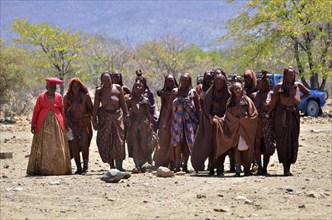 Mourning Himba women at a funeral, Omohanja, Kaokoland, Kunene, Namibia, Africa