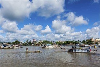 CAN THO, VIETNAM, 4 JUNE, 2011: Unidentified people at floating market in Mekong river delta. Cai