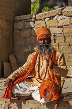 JAISALMER, INDIA, NOVEMBER 28, 2012: Indian sadhu (holy man) blessing. Sadhus are holy men who live