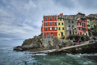 RIOMAGGIORE, ITALY, APRIL 25, 2019: Riomaggiore village popular tourist destination in Cinque Terre