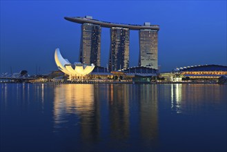 SINGAPORE, MAY 6: The Marina Bay Sands complex on sunset on May 6, 2011 in Singapore. Marina Bay