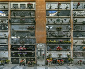 Wall with decorated graves at the Monumental Cemetery, Cimitero monumentale di Staglieno), Genoa,