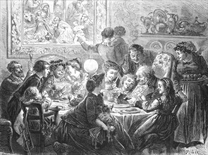 The Feast of the Kings, with the extended family at the table, 1869, France, Historic, digitally