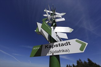 World signpost, Noah's Sails lookout tower on Ellenbogen, 813 m. high mountain in the Rhön in the