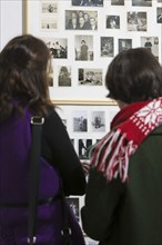 Visitors to the Gerhard Richter exhibition Atlas