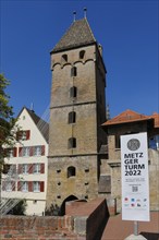 Metzgerturm with an installation by Johannes Pfeiffer, poster, information board, logos,