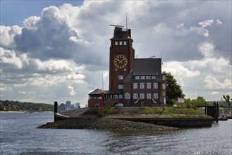 Seemannshöft pilot house, historic brick building with observation tower, clock tower on the Elbe,