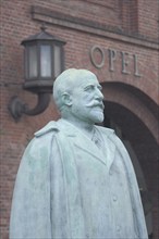 Monument and statue to Adam Opel 1837-1895 with inscription, personality, main portal, Rüsselsheim,