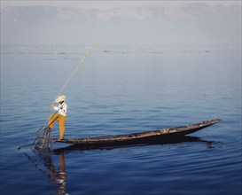 Myanmar travel attraction, Traditional Burmese fisherman at Inle lake, Myanmar famous for their