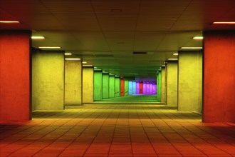 Colorful mulitcolord illuminated gallery tunnel rainbow passage under NAI building, Nederlands