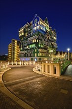 ZAANDAM, NETHERLANDS, MAY 8, 2017: Inntel Hotel in Zaandam illuminated at night. Design of