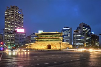 Seoul, South Korea, April 1, 2016 : Namdaemun Gate Sungnyemun at night with city traffic, Seoul,