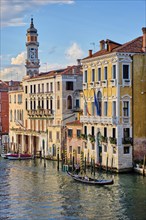 VENICE, ITALY, JUNE 27, 2018: Grand Canal with boats and gondolas on sunset, Venice, Italy, Europe