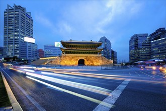 Seoul, South Korea, April 1, 2016 : Namdaemun Gate Sungnyemun at night with city traffic, Seoul,