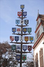 Maypole with guild signs at the town hall, symbols, profession, craftsmen historical, Lorsch, town