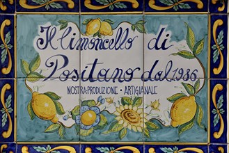 Wall tiles with advertising for Limoncello, Italian liqueur made of lemons, Positano, Amalfi Coast,