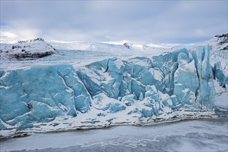 Glacier break in the Fjallsarlon glacier lagoon, drone image, Sudurland, Iceland, Europe