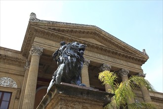 Old town of Palermo, lion sculpture in front of the Teatro Massimo, the opera house in the style of