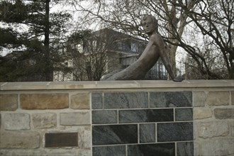 Bronze sculpture on the wall of the Erich Kästner Museum in Dresden