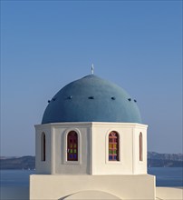 Close-up of blue dome of whitewashed church, Ia, Oia, Santorini, Greece, Europe