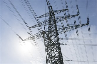 Power pylons, sun, Baden-Württemberg, Germany, Europe