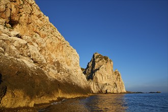 Evening light, Boat tour, View from the sea, Bizarre rock formations, Rugged mountains, Marettimo,