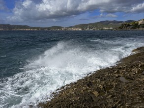 Surf, spray, waves breaking on the rocky coast, behind Peguera, Majorca, Spain, Europe