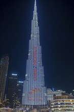 Night shot, illuminated advertising at the Burj Khalifa, Downtown, Dubai, United Arab Emirates,