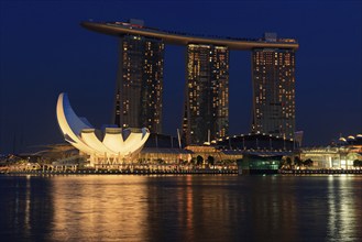 SINGAPORE, MAY 6: The Marina Bay Sands complex on sunset on May 6, 2011 in Singapore. Marina Bay