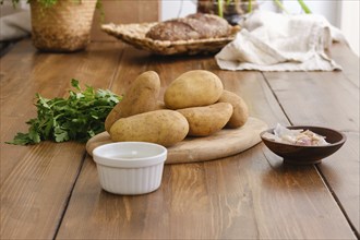 Ingredients for potato pancakes on a table