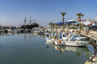 Fishing boats and excursion boats in the harbour of Agia Napa, Cyprus, Europe