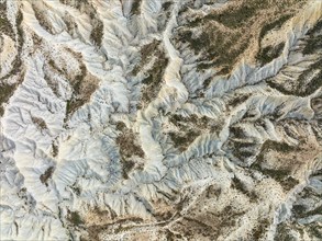 Bare ridges of eroded sandstone in the badlands of the Tabernas Desert, Europe's only true desert,