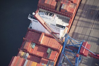 Container ship of the shipping company Hamburg Süd the Santa Aerial view of the container ship of