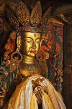 Maitreya Buddha statue close up Tibetan monastery Thiksey Gompa. Ladakh, Jammu and Kashmir, India,