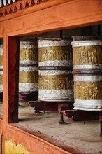 Buddhist prayer wheels in Hemis gompa (Tibetan buddhist monstery) . Ladakh, India, Asia