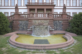 Ornamental fountain with water basin at Philippsruhe Castle, Kesselstadt, Hanau, Hesse, Germany,