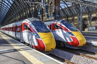 Azuma express trains of the London North Eastern Railway LNER at King's Cross station in London,