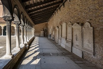 Cloister with tombs, church Chiesa di San Michele in Isola, cemetery island of San Michele, Venice,