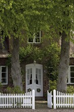 Traditional Frisian thatched house in Oldsum on the Island of Föhr, Nordfriesland, North Frisia,