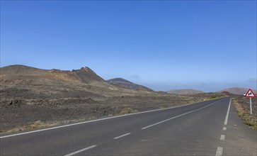 Road through lava fields, Lanzarote, Canary Islands, Spain, Europe