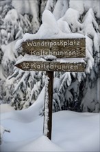 Snowy signpost near the Hornisgrinde, near Sasbach, Ortenaukreis, Black Forest, Baden-Württemberg,