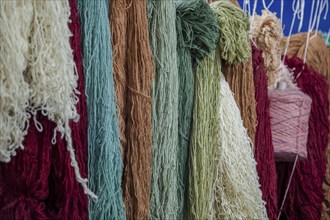 Colourful carpet yarns in a carpet factory, Turkey, Asia