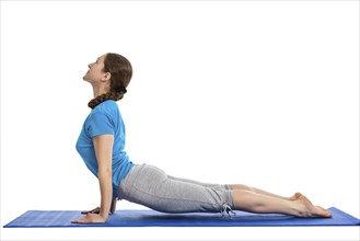 Yoga, young beautiful woman yoga instructor doing Upward Facing Dog Pose (Back Bend) (Urdhva Mukha