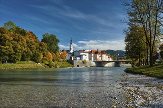 View of Bad Tolz, picturesque resort town in Bavaria, Germany in autumn and Isar river