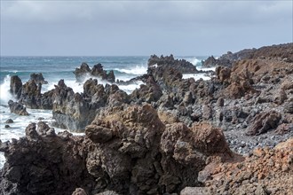 Lava rocks in the sea, surf, near Los Hervideros, Lanzarote, Canary Islands, Spain, Europe