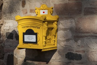 Historical yellow letterbox, Halberstadt, Saxony-Anhalt, Germany, Europe