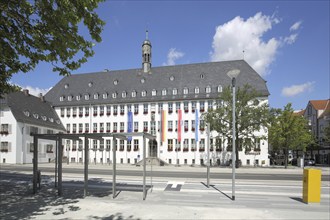 Town hall with EU flag, state flag, national flag and city flag, Rüsselsheim, European, German,