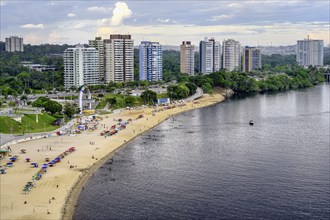 Punta Negra Beach in front of Manaus skyline, Amazonia State, Brazil, South America